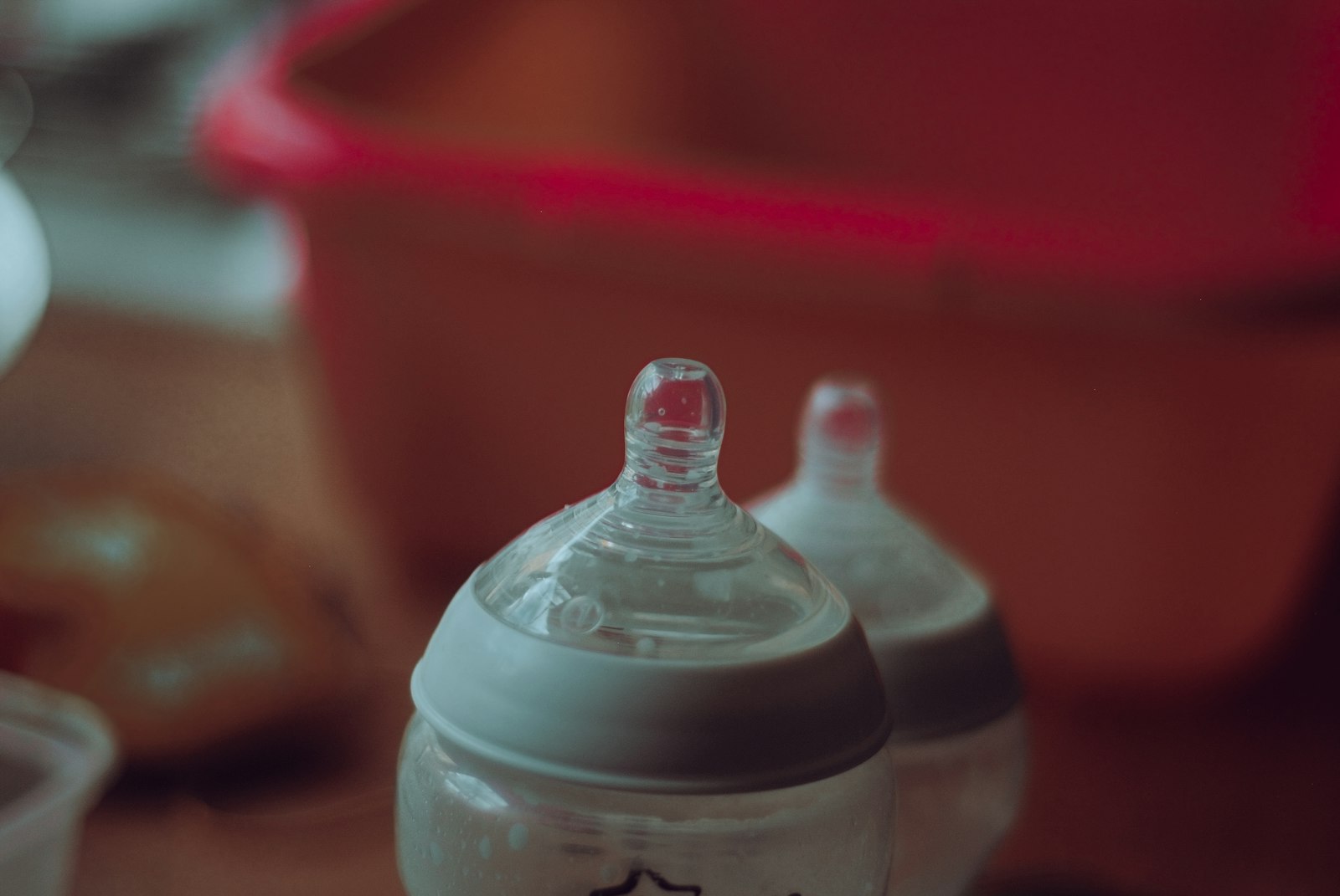 Clear baby bottles used for storing pumped milk