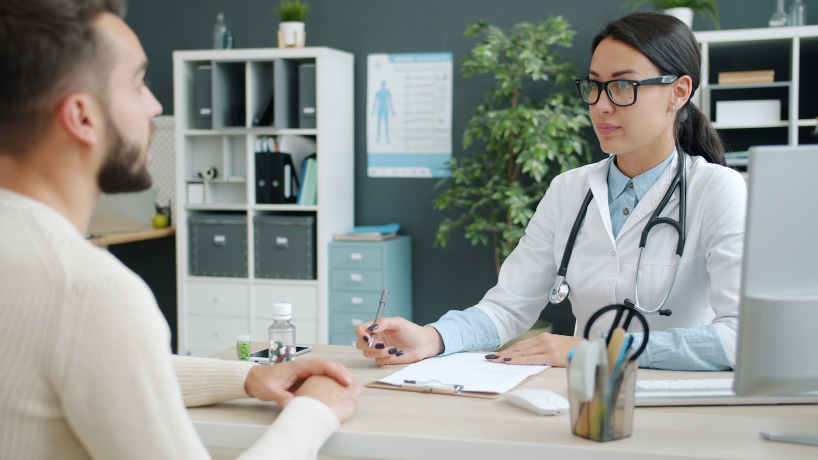 Doctor consulting with a patient during an office visit